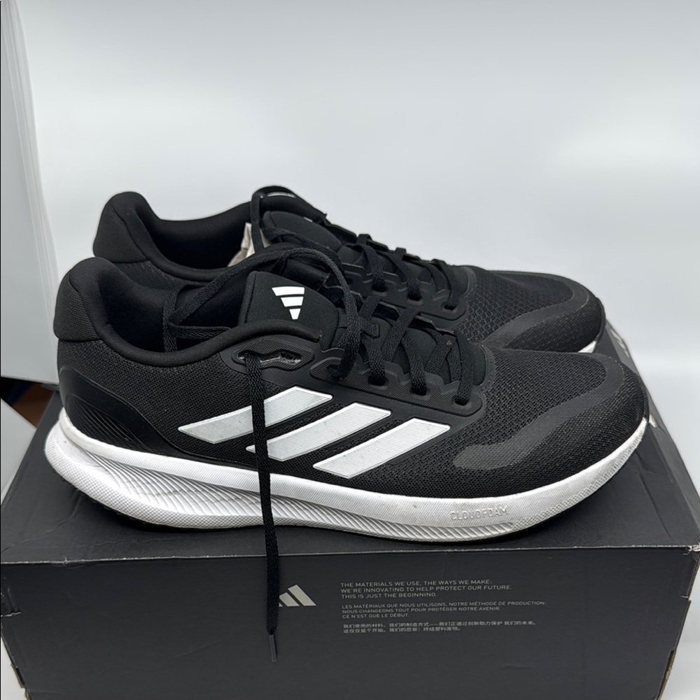 Adidas Black and White Athletic Shoes with Sleek Design